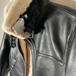 H&M Divided brand black biker jacket in faux leather. Faux fur lining. Size S
